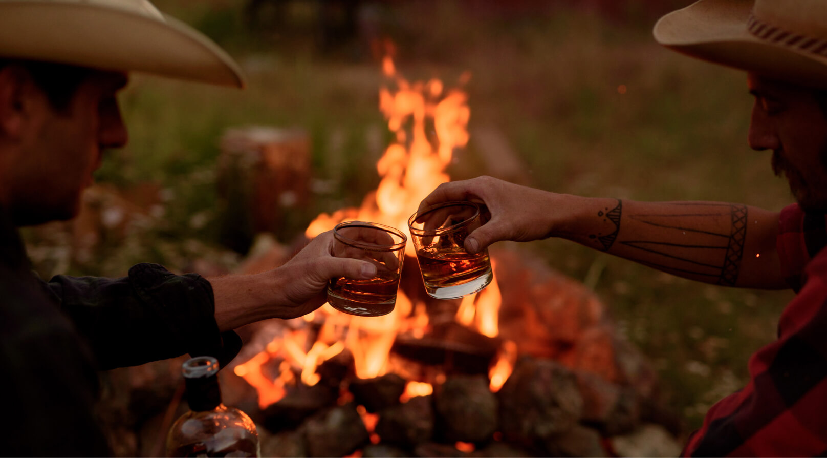 Drinking Pendleton® Whisky by the campfire